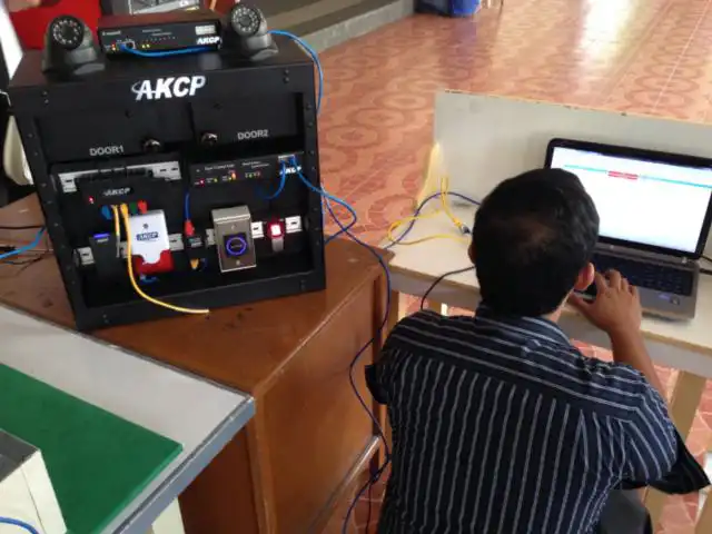 Holy Angel University Student working with AKCP equipment
