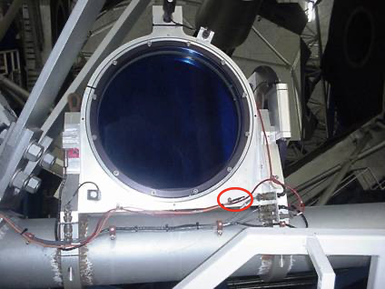 The AKCP Dual Temperature and Humidity Sensor circled in red