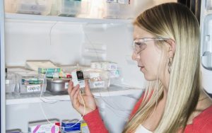 pharmacist-checking-vaccines