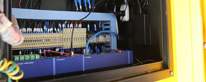 SPX+ with 3G modem and 10x dry contact I/O module installed at generator control panel.